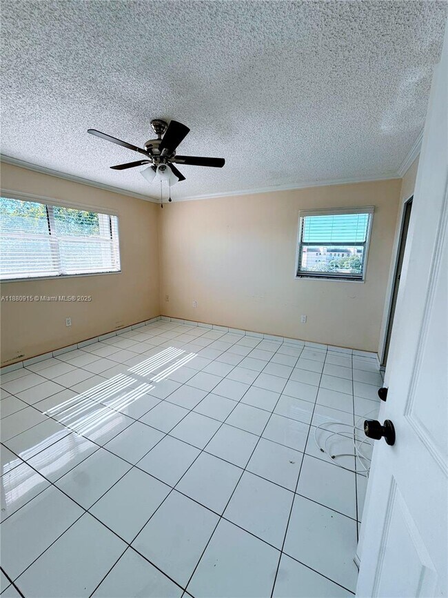 Building Photo - 8595 Sunrise Lakes Blvd