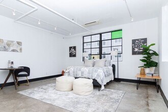 Building Photo - Check out this studio ! We want you to cal...