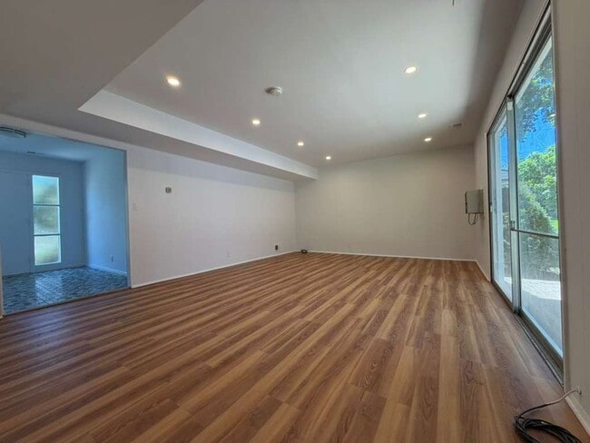 Building Photo - Spacious 4-Bedroom Home with Functional Layout, Backyard Access & Attached Garage