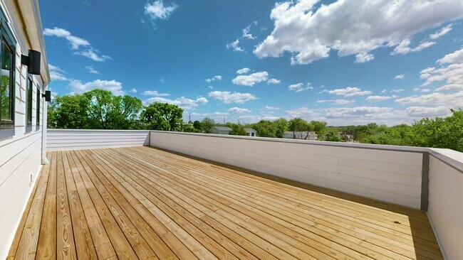 Building Photo - NEW BUILD with Rooftop!