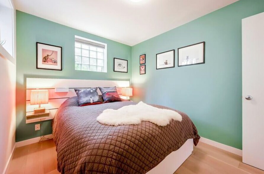 2nd bedroom has windows with blackout blinds andQueen-size bed with pillow top mattress - 328 Harriet St
