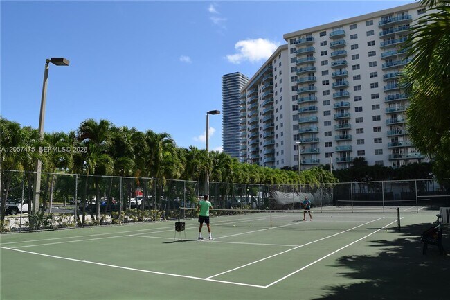 Building Photo - 19380 Collins Ave