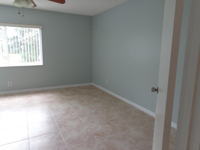 Building Photo - 5860 Whispering Pine Way
