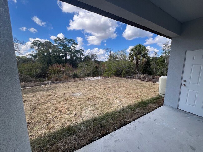 Building Photo - Brand-New 3BR/2BA Home with Garage – Serene Lake Placid Neighborhood