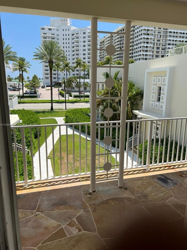 Building Photo - 9910 Collins Ave