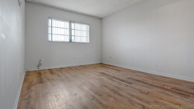 Building Photo - 5890 NW 64th Ave