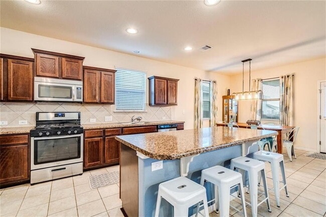 Building Photo - Four Bedroom Home Available for June Move-In!