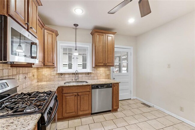 Building Photo - This charming gingerbread home in St. Loui...