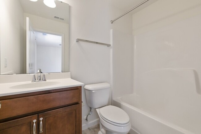 Building Photo - End Unit Townhome | Washer/ Dryer Included...