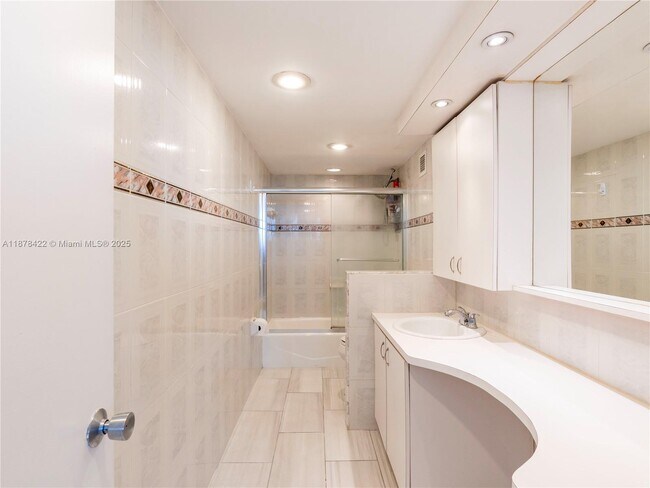 Building Photo - 5005 Collins Ave
