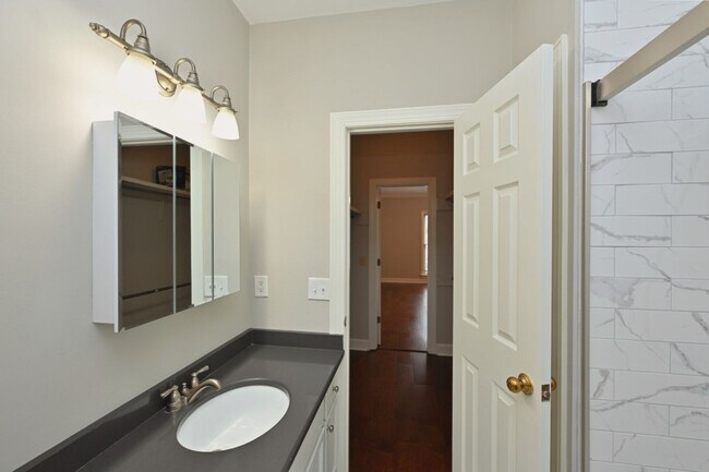 Building Photo - **UPDATED FIRST-FLOOR CONDO IN DESIRABLE P...