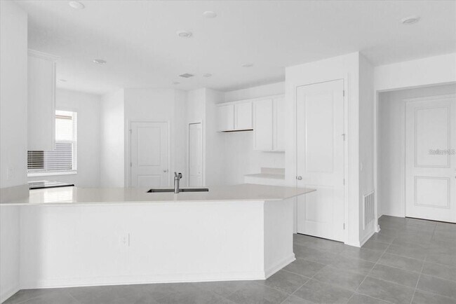 Building Photo - 4385 Pebbles Throw Dr