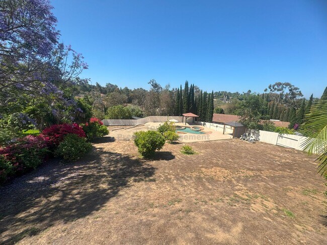 Building Photo - Spacious 4-Bedroom Home on Expansive Lot i...