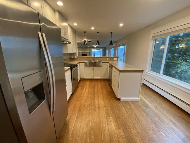 Building Photo - Spacious 2-Bed, 2-Bath Duplex Retreat Over...