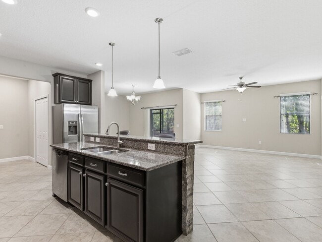 Building Photo - Stunning 3 BR + LOFT/2.5 BA /2-Car Garage townhome in the highly desirable GATED community of Hid...