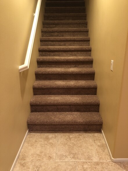 Stairs going up to second floor,bedrooms all upstairs . - 6395 Delgado Ln