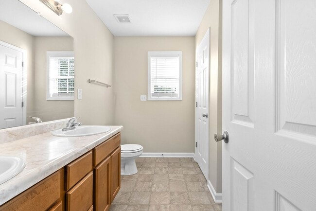 Building Photo - Pet Friendly Three Bedroom with Bonus!