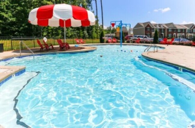 Building Photo - Your Dream Townhome is One of last 2 - Cla...