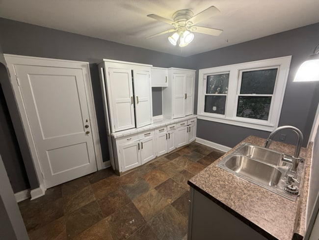 Building Photo - ? Updated 4BR/2BA Single-Family Home — Garage Parking, Water & Lawn Care Included ?