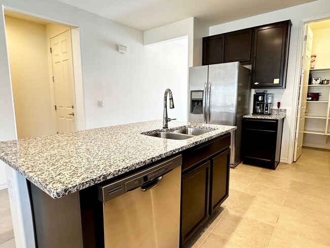 Building Photo - BEAUTIFUL VERRADO 3 BEDROOM PLUS DEN WITH ...
