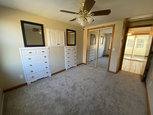 Bedroom with built in dressers and closet - 9 Holman Rd