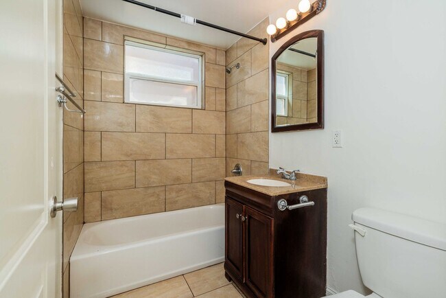 Building Photo - UPDATED, Spacious 1BR! DECK! STAINLESS APPLIANCES! HARDWOOD!