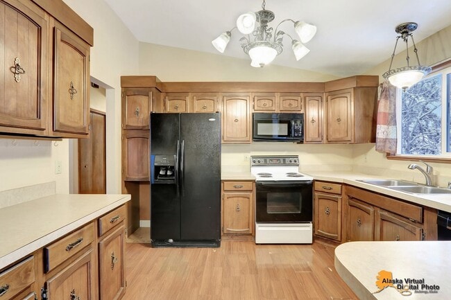 Building Photo - Spacious Home with Garage & Fenced Yard Near JBER & Major Hospitals