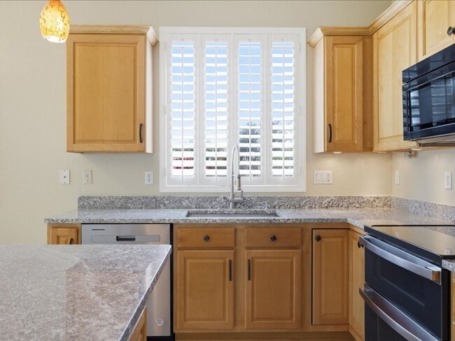Building Photo - Spacious Living in a Gated Community with Amenities!