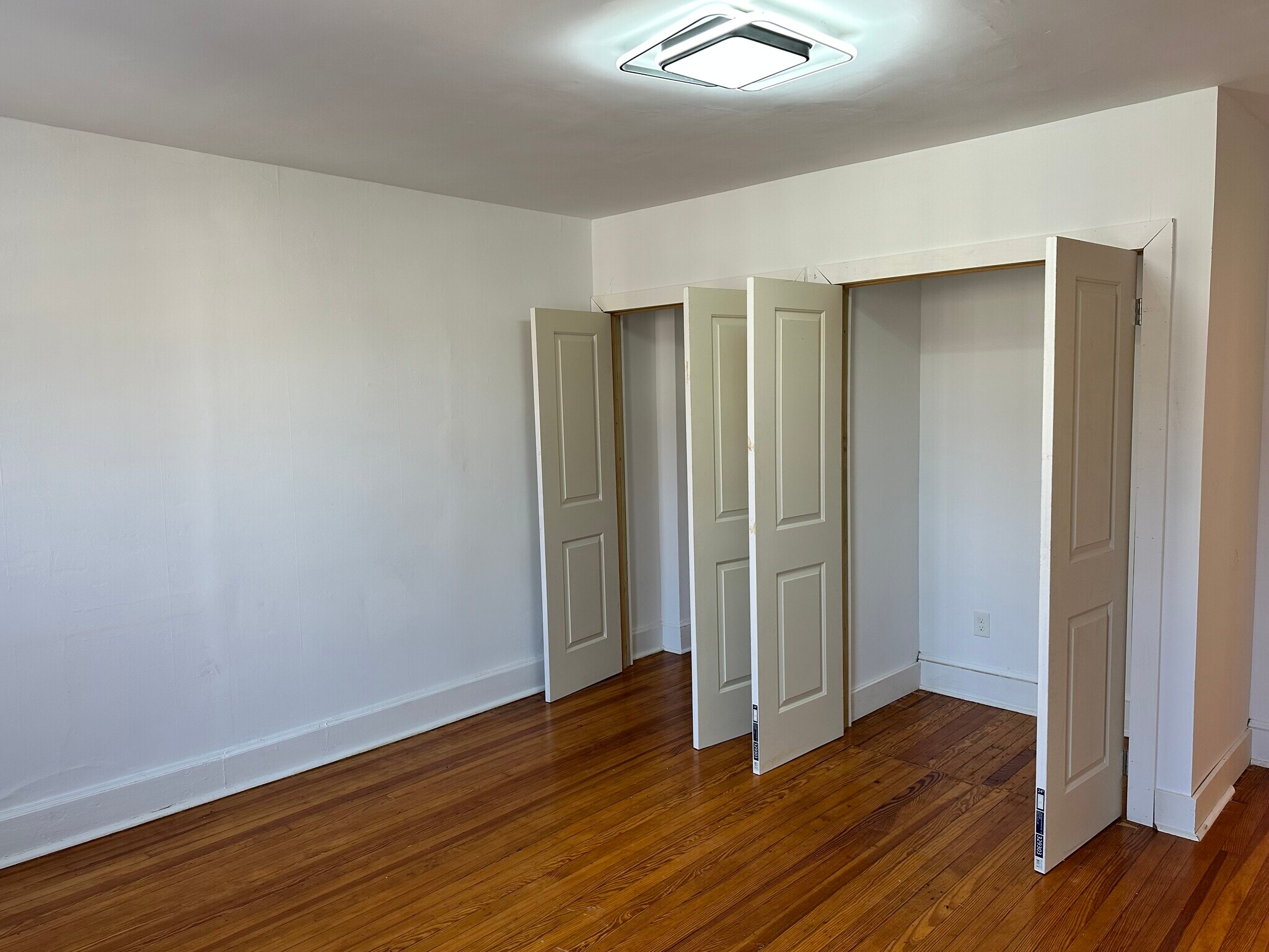 Bedrooms with original wood floors, LARGE walk in closets. - 328 High St