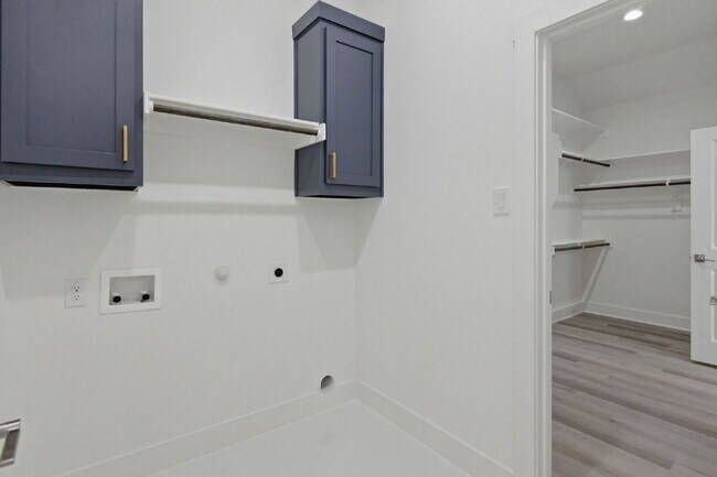 Building Photo - "New Construction 3-2-2 Home with Designer Touches Throughout!"