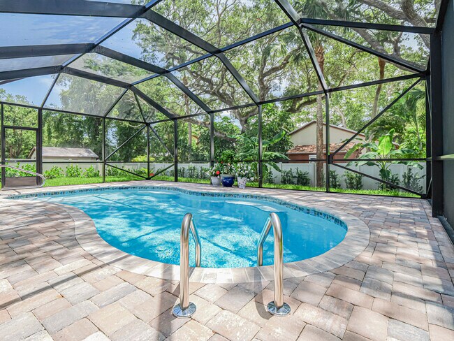 Building Photo - 9340 Frangipani Dr