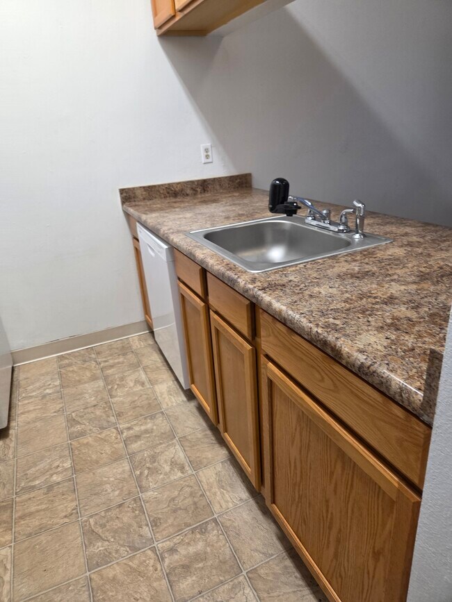 Building Photo - Stonecreek Park Condominiums