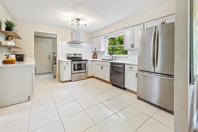 Building Photo - 3607 E 24th Ave