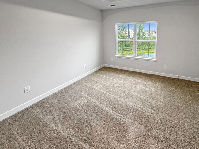 Building Photo - Spacious 3-Bedroom Townhome with Finished ...