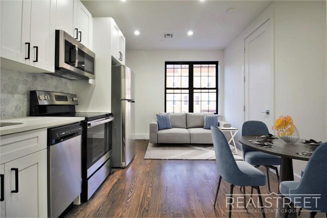 Primary Photo - Brand New 2 BED with PRVIATE ROOF DECK & W...