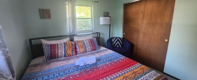 Closet space and your own reading corner with lamp. - 5914 Wilson Dr