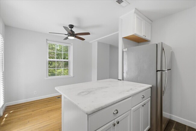 Building Photo - Elegant End-Unit Fairlington Villages Townhome with Private Balcony & Exceptional Community Ameni...