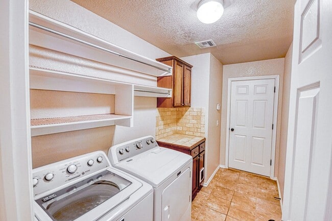 Building Photo - Beautiful three bedroom home with in-ground storm shelter!