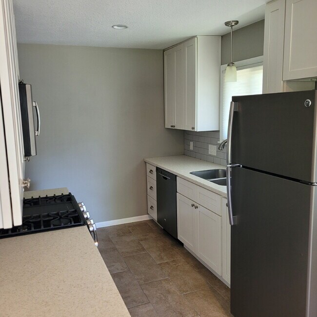 Building Photo - "Charming 3-Bed Home with Finished Basemen...