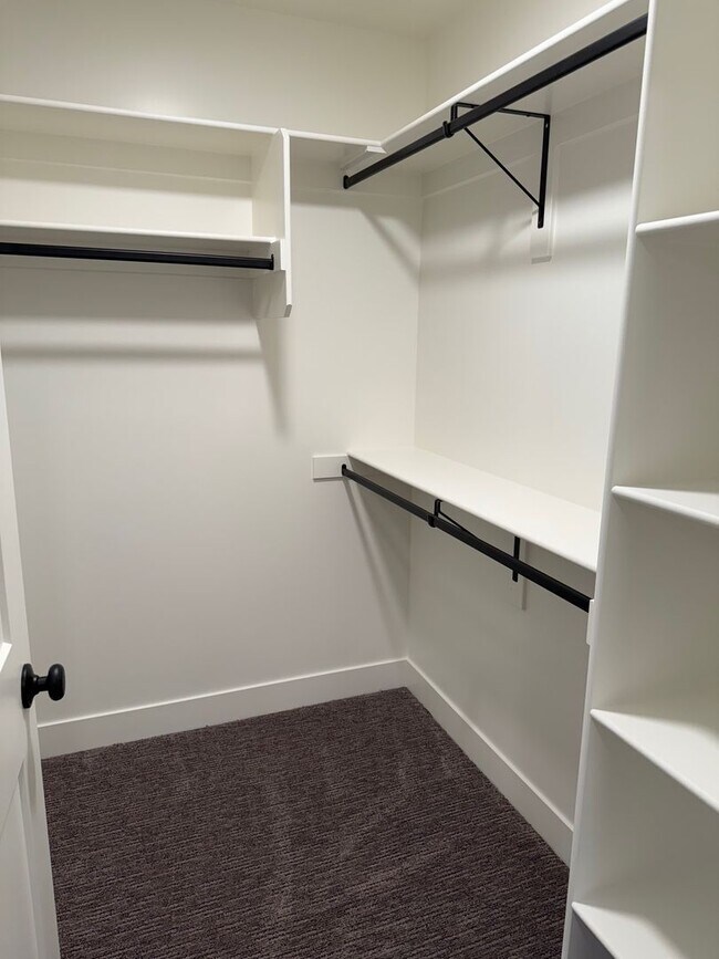 Building Photo - Half off first months rent - Beautiful townhome with 2 car garage, Central Air and Master Suite