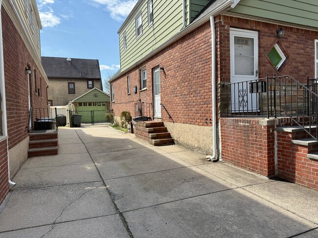 Building Photo - 203-16-203-42 42nd Ave