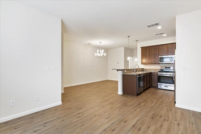 Building Photo - The Sierra - Beautiful 2 Bedroom Luxury Townhome with Loft, 2.5 Bath and 2 Car Garage