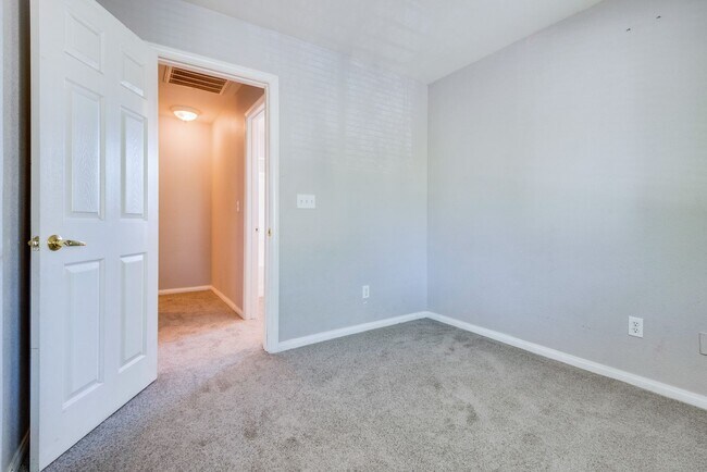 Building Photo - Very nice kept two-story 3 bedroom 2 bath house in a small gated community on the east side