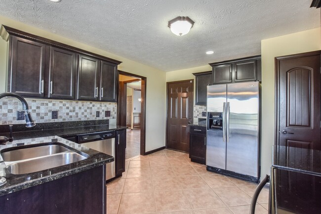 Building Photo - Pet Friendly with No Backyard Neighbors!