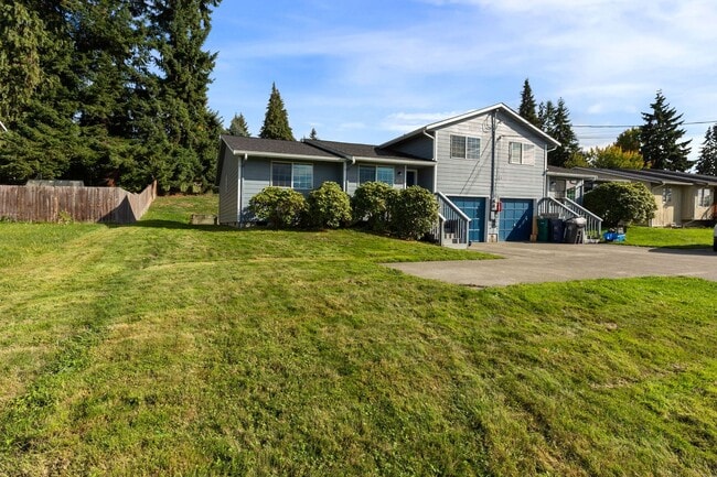 Building Photo - Recently updated 3 bdrm, 2 bath. Attached garage. Wrap around yard. Private upstairs bedroom and ...