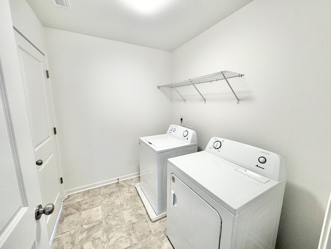 Building Photo - 3 br paired home with 2nd floor loft 2 car garage near I-40 and I-77