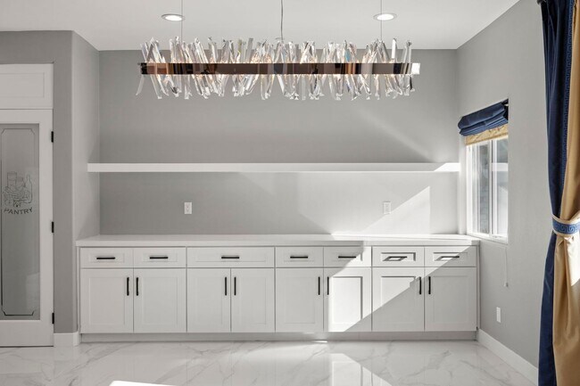 Building Photo - Modern Elegance Meets Scenic Privacy in Be...