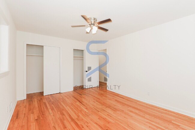 Building Photo - Move in before February 15th and choose your reward: a $250 Amazon Gift Card or a 55" Smart TV!