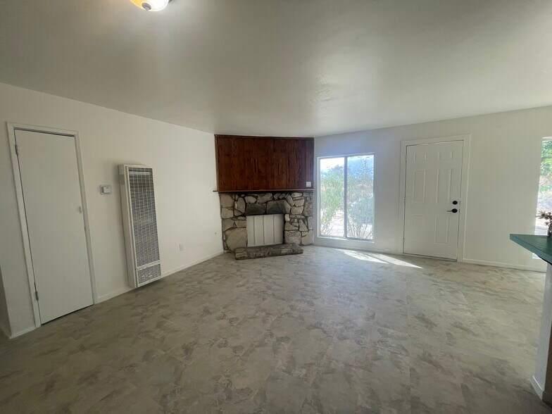 Living Room area w/ wall heater - 13429 Davenport St