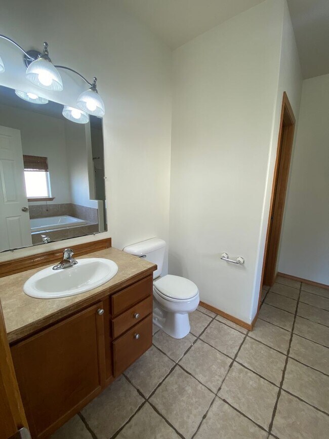 Building Photo - April Rent FREE - Triple Car Garage